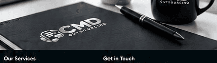 CMD branded notebook on desk